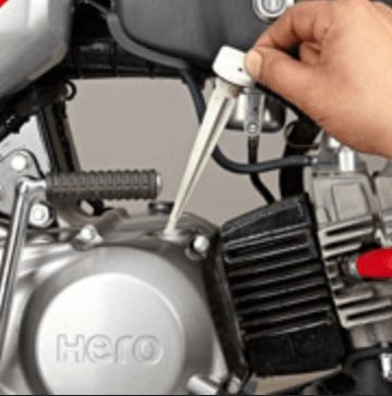 Mechanic checking the Engine Oil
