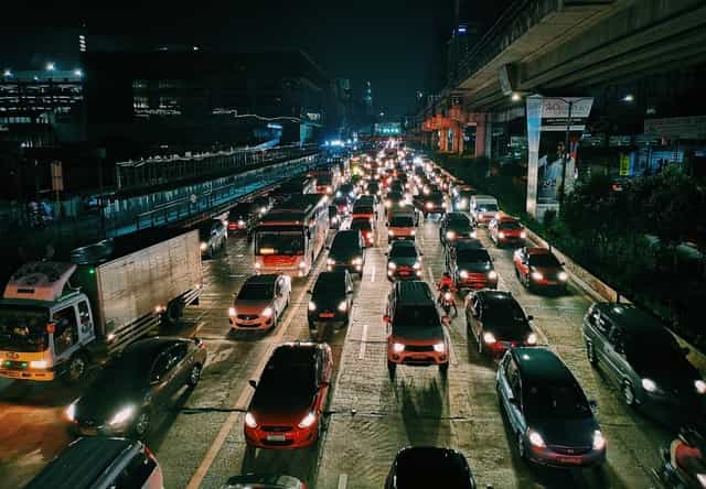 bikers stuck in Traffic Jam