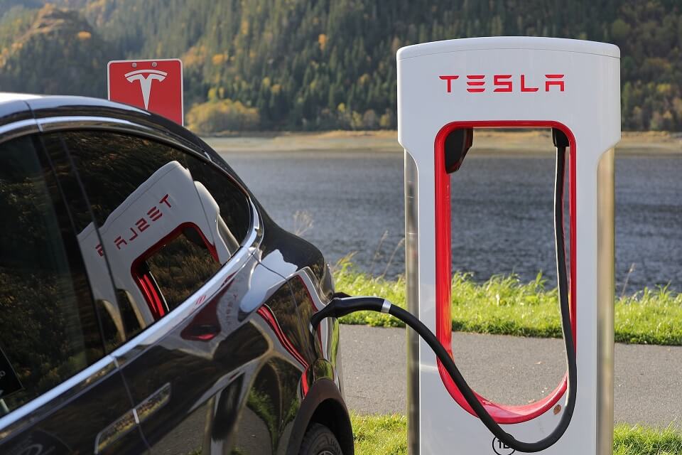 tesla electric car is being charged in Tesla Supercharger