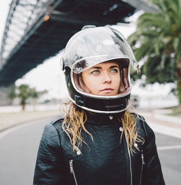 Women rider wearing helmet for safety